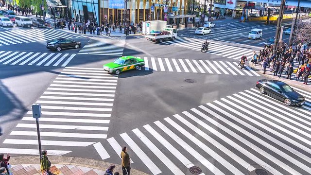 4K,Time lapse traffic and crowd people at ginza district intersection in Tokyo of Japan