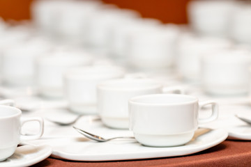 White coffee cup placed on the table for break time
