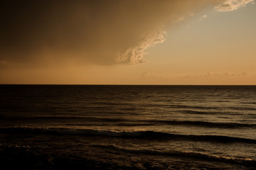 View on dark overcast sky and Mediterranean sea