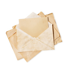 Empty old vintage yellowed paper sheets and card in envelope