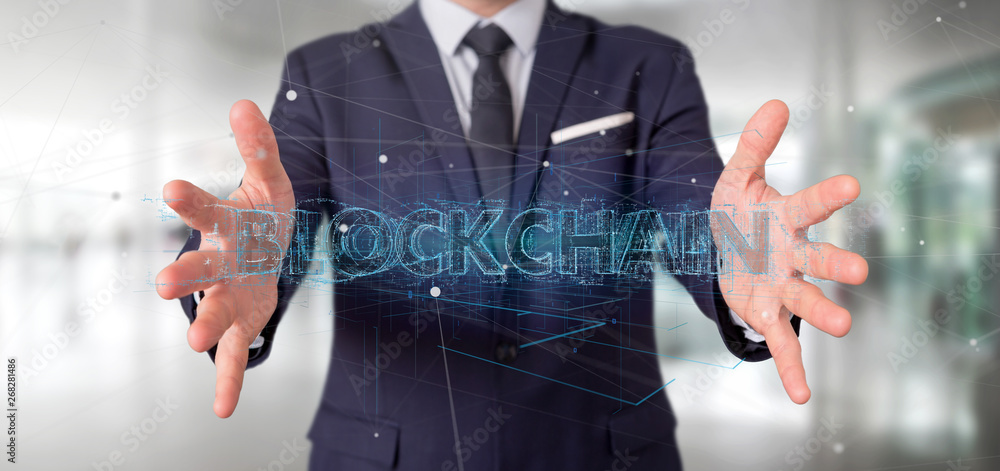 Poster businessman holding a blockchain title isolated on a background