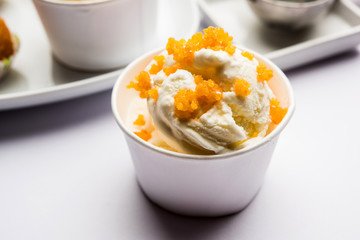 Bundi / Motichoor Ice cream is a fusion of Ice-cream with indian traditional sweet motichur laddoo from India, selective focus