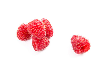 Ripe raspberries isolated on white background.