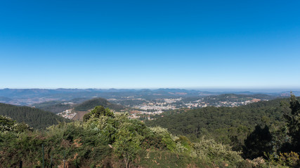 scenic view from Doddabetta peak, highest peak in nilgiri district, forest reserve with the blue sky background. 