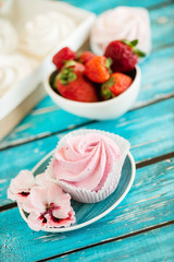 Beautiful delicious dessert. Zephyr in the shape of flowers roses.