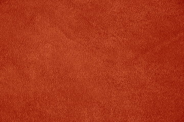 The texture of genuine leather. Impeccable and stylish background.  Beautiful stylish background. Natural skin texture close up. Brown background.  The structure of the leather material brown shades.
