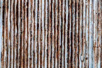 Arrière plan plaque de métal ondulé rouillé