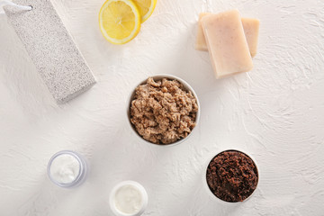 Composition with body scrub on table