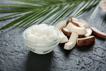 Bowl with body scrub on table