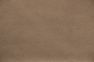 Fototapeta premium The texture of genuine leather. Impeccable and stylish background. Beautiful stylish background. Natural skin texture close up. Brown background. The structure of the leather material brown shades.