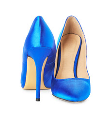 Pair of stylish female shoes on white background