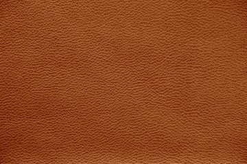 The texture of genuine leather. Natural skin texture close up. Brown background.  The structure of...