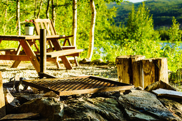 Rest stop area picnic site on fjord lake shore