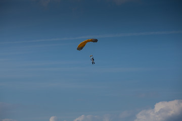 Skydive, people in the sky, under clouds