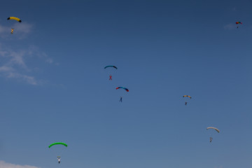 Skydive, people in the sky, under clouds