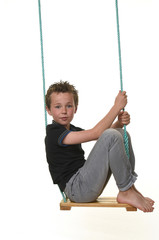 child playing with a swing on a white background