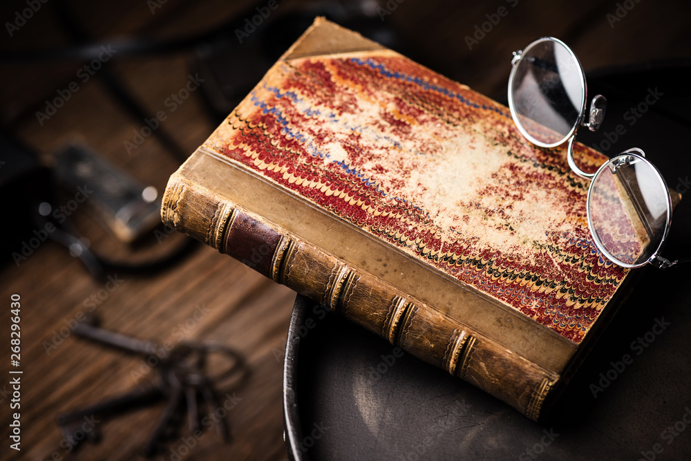 Wall mural antique leather bound book