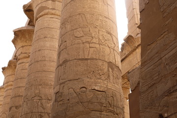 View of the column with ancient hieroglyphics at the Karnak Temple in Luxor, Egypt. Travel to the...