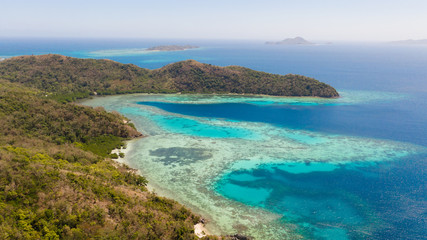 Islands of the Malayan archipelago with turquoise lagoons. Nature of the Philippines, top view. Philippines, Palawan