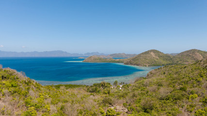 Islands of the Malayan archipelago with turquoise lagoons. Nature of the Philippines, top view. Philippines, Palawan