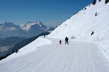 Fototapeta na wymiar Ski, winter, snow - family enjoying winter vacation in Verbier, Switzerland