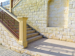 textured street wall. Facade of the house of a city street Background for model shooting