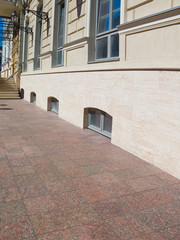 textured street wall. Facade of the house of a city street Background for model shooting