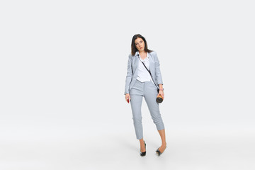 No desire. Young woman comes to work rumpled and untidy because it's deadline. She has no time for morning, clothing and make up. Concept of office worker's troubles, business, problems and stress.