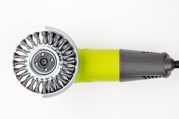 Angle grinder with metal brush on white background