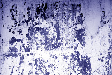 Сraked weathered cement wall texture in blue tone.