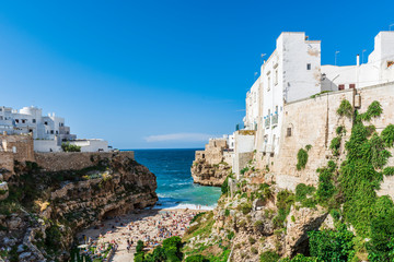 Rough sea on the coast of Puglia. Enchantment of Polignano a Mare. Italy