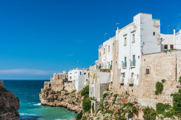 Rough sea on the coast of Puglia. Enchantment of Polignano a Mare. Italy