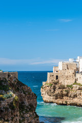 Rough sea on the coast of Puglia. Enchantment of Polignano a Mare. Italy