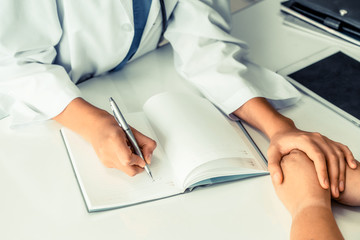 Female patient visits woman doctor or gynecologist during gynaecology check up in office at the...