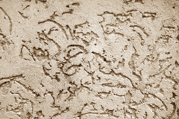 Old wall texture as background in brown color.