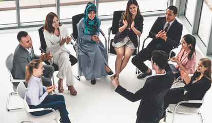 Businesswomen and businessmen attending group meeting conference in office room. Corporate business team concept.