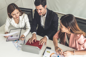 Businessman is in meeting discussion with colleague businesswomen in modern workplace office....