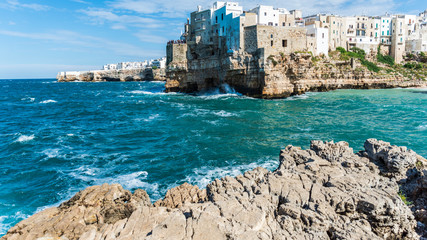 Rough sea on the coast of Puglia. Enchantment of Polignano a Mare. Italy