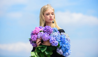 Stop allergy blooming season. Enjoy spring without allergy. Springtime bloom. Pollen allergy. Gentle flower for delicate woman. Girl tender blonde hold hydrangea flowers bouquet. Allergy free life