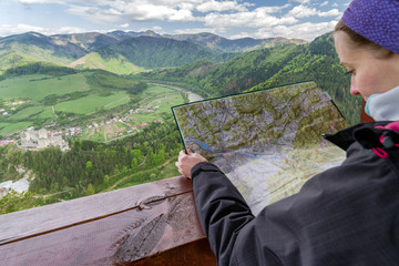 Woman looking from lookout Spicak, Slovakia