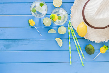 Mojito cocktails in glasses with straw hat