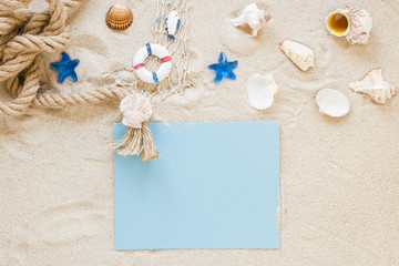 Sea shells  with nautical rope and paper