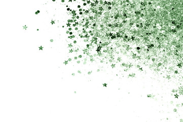 Green glitter sparkles on white background.