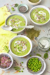 Green cream soup made with zucchini, potatoes, spinach and green peas