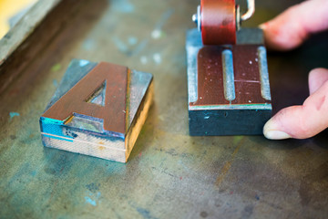 Wooden letterpress type characters, typography.