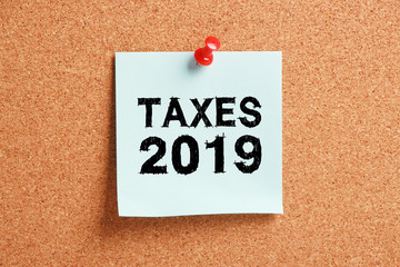 Taxes 2019 Concept On Sticky Note
