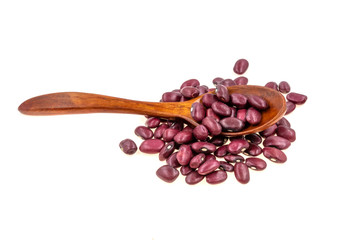 Wooden spoon with red beans isolated on white background
