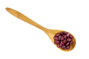 Wooden spoon with red beans isolated on white background