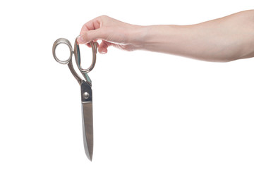 Hand holding big steel scissors, industrial tool