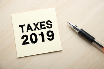 Taxes 2019 Concept On Sticky Note